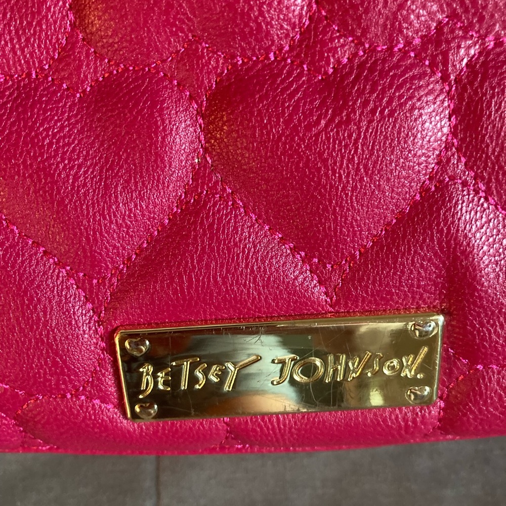 Betsy Johnson pink heart design purse.